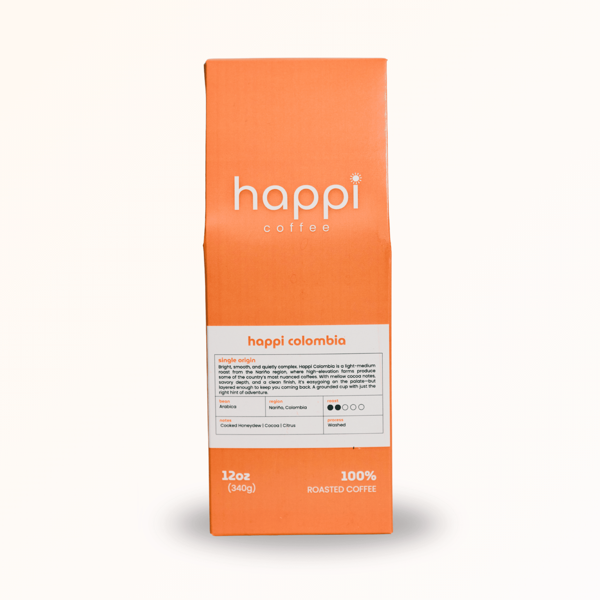 Front view of 12 oz bag of Happi Colombia. Best Light Roast Coffee Beans with Bright Citrus, Cocoa Warmth & Smooth Body, Available Ground or Whole Bean