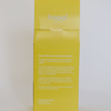 Back view of 12 oz bag of happi bright light roast coffee – available in whole bean or ground