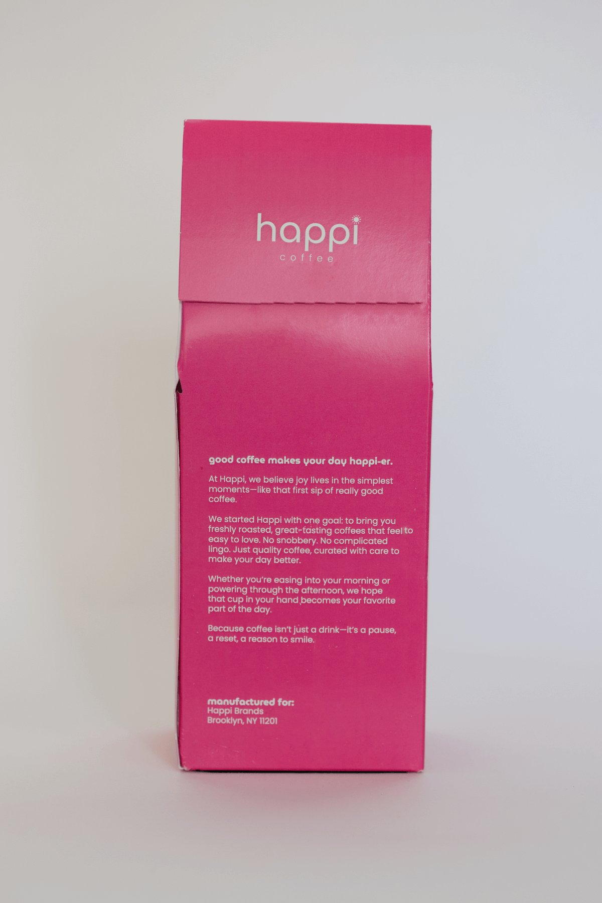 Back view of 12 oz bag of happi guatemala light roast coffee – available in whole bean or ground