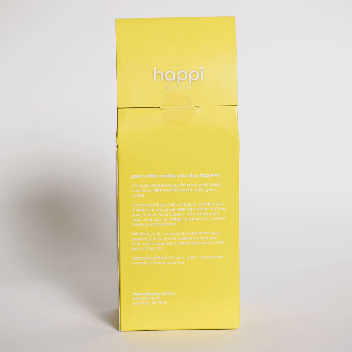 Back view of 12 oz bag of Happi Bright. Best Light Roast Coffee Beans with Citrus & Floral Flavor, Available Ground or Whole Bean