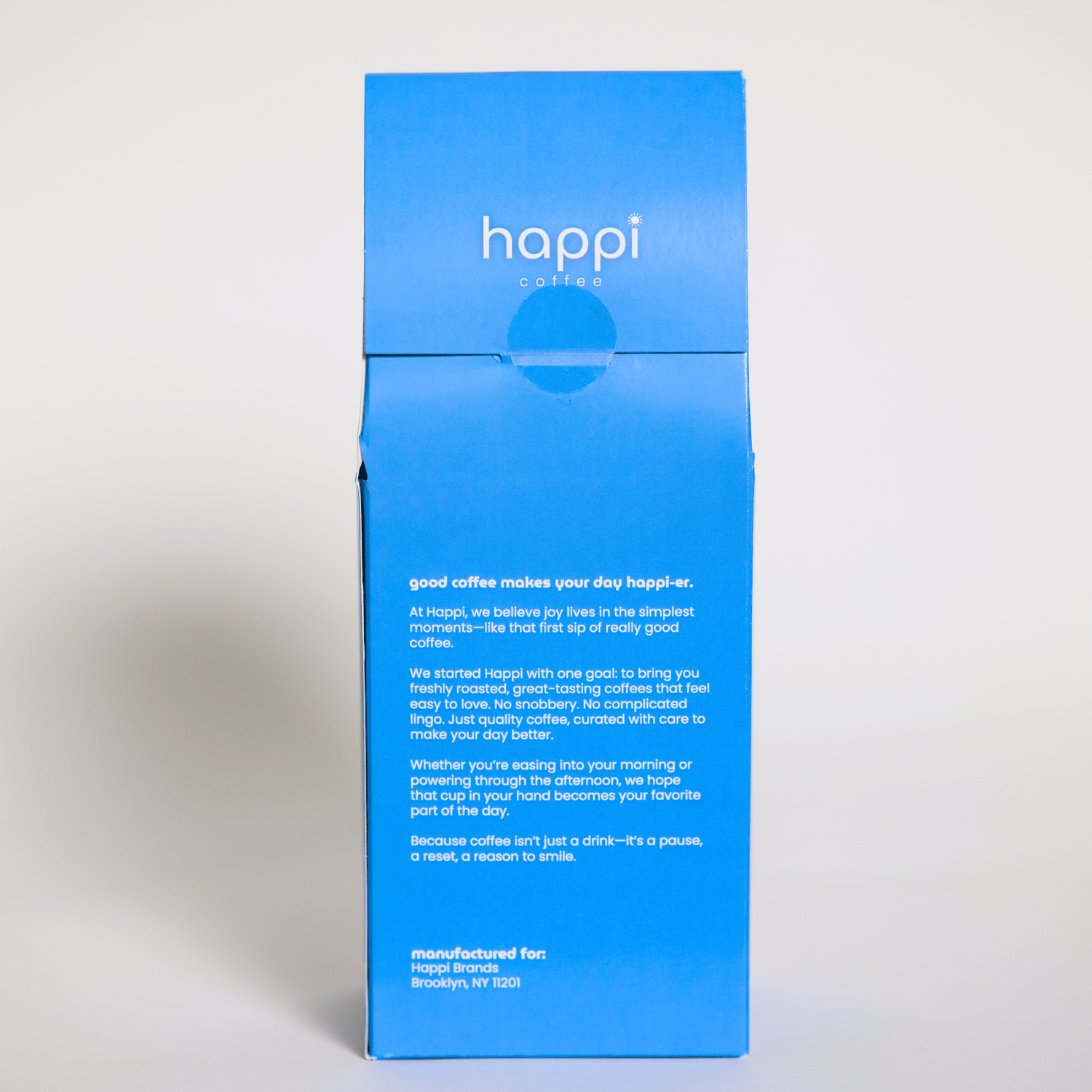 Back view of 12 oz bag of happi decaf medium roast coffee – available in whole bean or ground