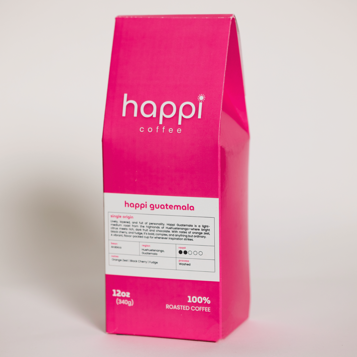 Side view of 12 oz bag of happi guatemala light roast coffee – available in whole bean or ground